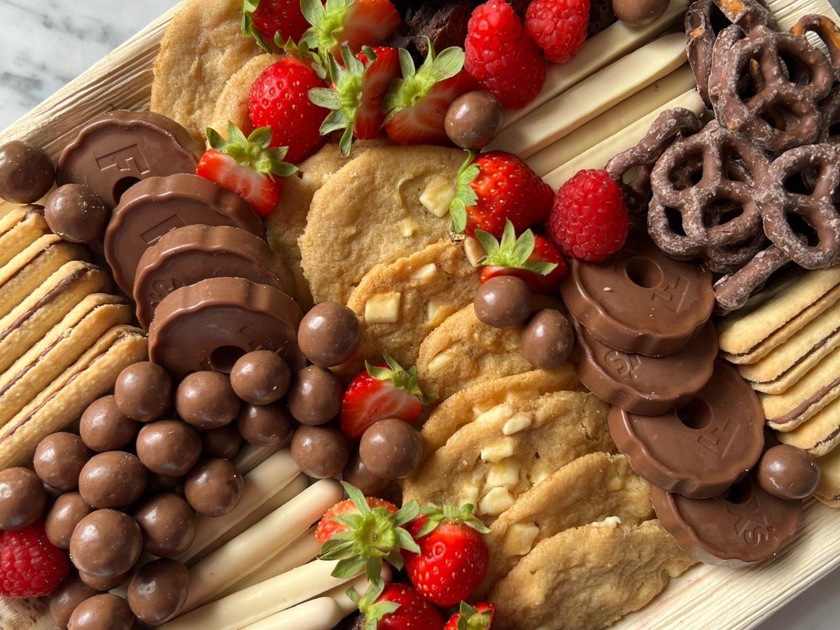 The Sweet Escape dessert grazing board with brownies, chocolate, berries and sweet treats